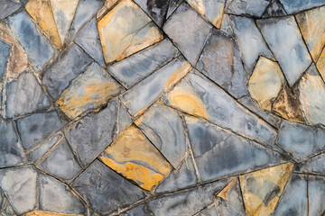 Textured background of stone cladding