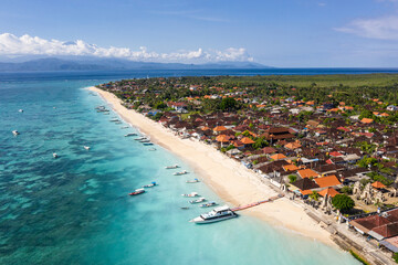 Stunning aerial view of the Nusa Lembongan with a speed boat anchored in the Jungut Batu village...