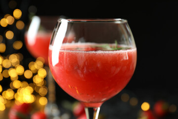 Concept of delicious drink with Rossini cocktail on background with blurred lights
