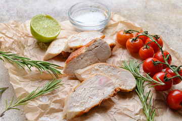 Tasty chicken fillet on light background