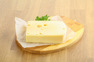 Maasdam cheese over the board