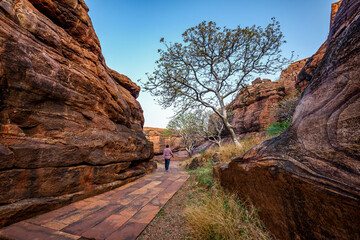 Path through steep cliffs, Entrance for lower and upper Shivalaya in Badami, Karnataka, INDIA.