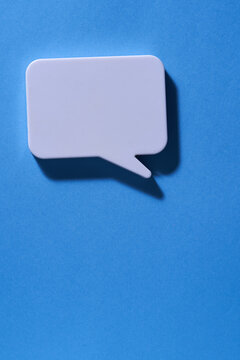 blank speech buble on blue background