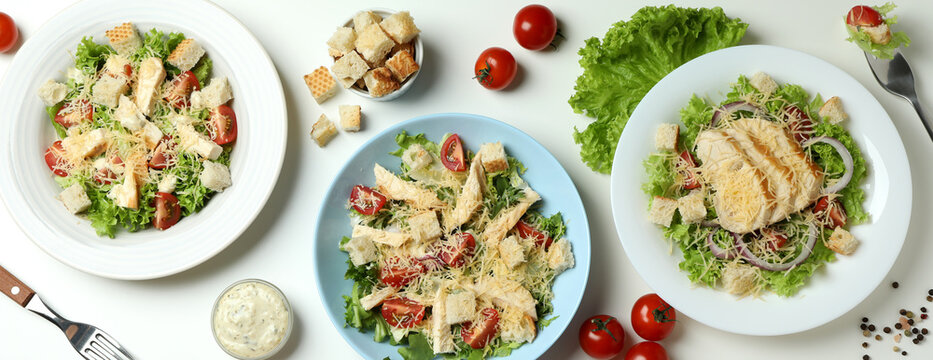 Concept of tasty eating with Caesar salad on white background