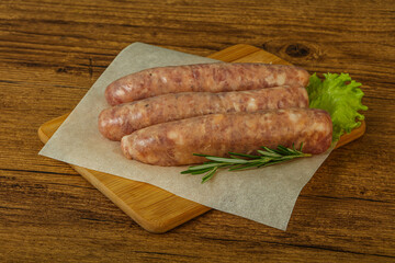 Raw pork meat sausages for grill