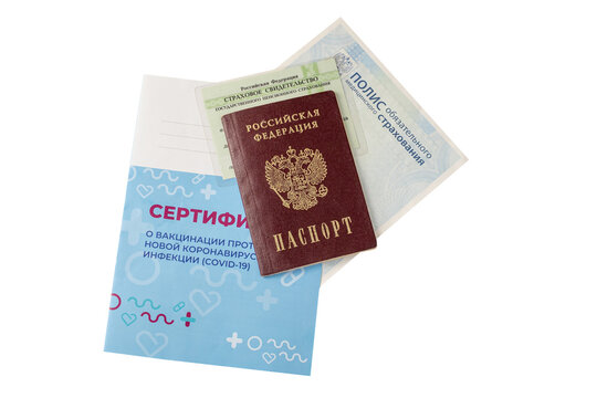Close-up of the passport, insurance policy, insurance certificate and certificate of vaccination