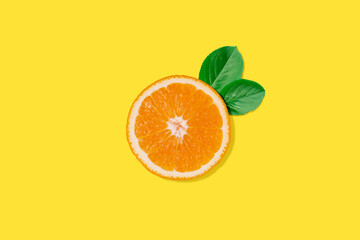 Creative concept food health diet photo of cut raw orange fruit on orange background.