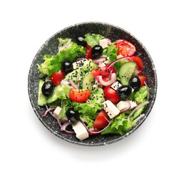 Plate with tasty Greek salad on white background