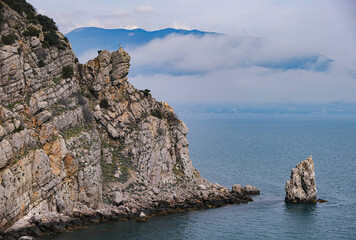 Fototapeta na wymiar Panoramic view of blue sea, sky and mountains. Travel concept.