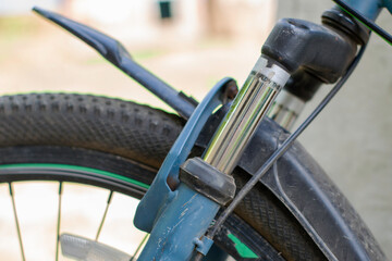 shock absorber of the front fork of a sports bike close-up - obrazy, fototapety, plakaty