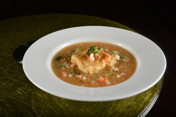 asian premium banquet menu braised homemade bean curd tofu in thick seafood gravy sauce on gold background dining table
