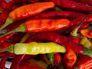 Close up shoot of red hot chillies on a white background