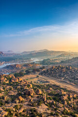Obraz premium View of Matanga Hill during the sunrise, Unesco World Heritage town in Hampi, Karnataka, India