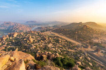Obraz premium View of Matanga Hill during the sunrise, Unesco World Heritage town in Hampi, Karnataka, India