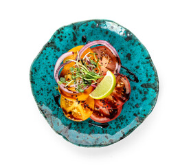 Plate with tasty tomato carpaccio on white background