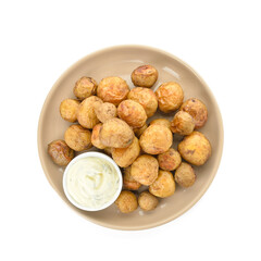 Plate with tasty baked potato and sauce on white background