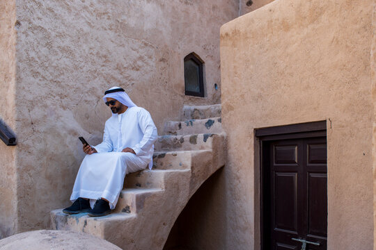 Arab Emirati Young Entrepreneur taking over the phone