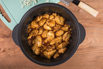 Cooking braised chicken in the pan - fried chicken breast, top view