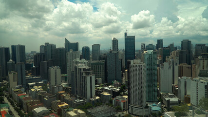 Manila city with skyscrapers, modern buildings and Makati business center. Travel vacation concept.