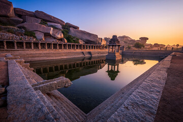 View of sunrise at Pushkarni, Sri Krishna tank in ruins. Hampi, karnataka, India.