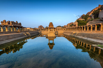 View of sunrise at Pushkarni, Sri Krishna tank in ruins. Hampi, karnataka, India.