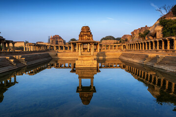 View of sunrise at Pushkarni, Sri Krishna tank in ruins. Hampi, karnataka, India.
