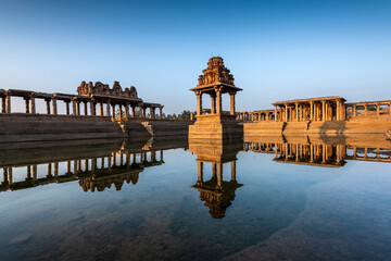 View of sunrise at Pushkarni, Sri Krishna tank in ruins. Hampi, karnataka, India.