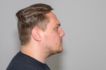 Profile view of a young man in his twenties
