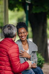 Adult man, making his African wife laugh.