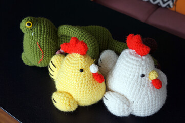 handmade crochet animal and chicken doll. wool toy handicraft.