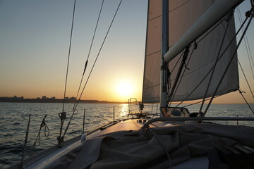 sunset on the nile. sunset on the sea. sailboat at sunset. 