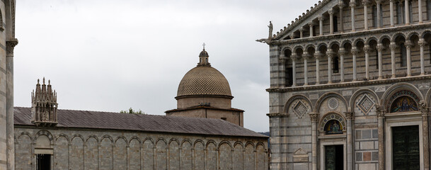 Fototapeta premium View to the cathedral of Pisa located on Piazza dei Miracoli (Square of Miracles)