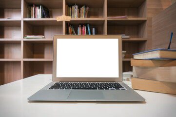 Laptop with Mock up blank screen on wooden table in front of cafe space for text. product display computer laptop montage- technology Freelance work concept