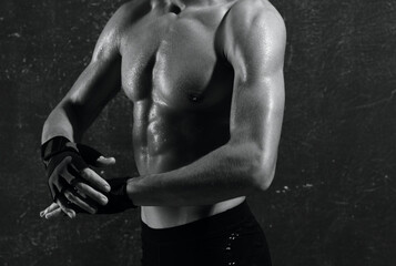 Naklejka premium sports man inflated torso posing black and white photo fitness