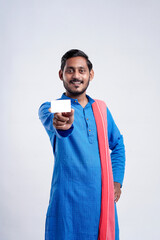 Young indian farmer showing card on white background