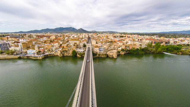 aerial views of the ebro river with boats and villages
