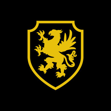 Logo heráldica con silueta de grifo medieval de pie en escudo de color amarillo y fondo negro