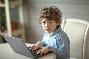 boy using laptop