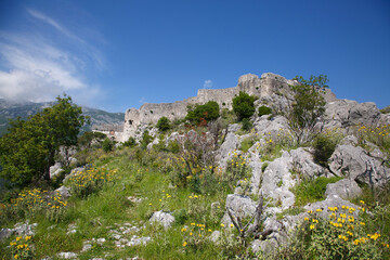 Fototapeta na wymiar Stone wall of the old fortress Hai Nehai, Montenegro.