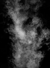 Vapour rising against dark background portrait