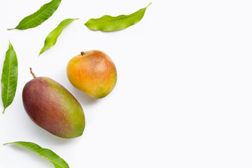 Mango, Tropical fruit with leaves on white background. Top view