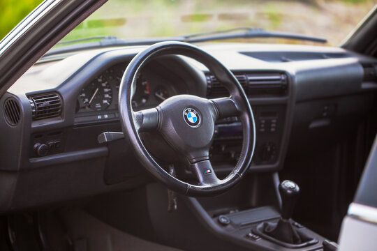 KYIV, UKRAINE - May 21, 2020: Steering wheel of an old german car - BMW e30