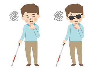 白杖を持った視覚障がいの男性