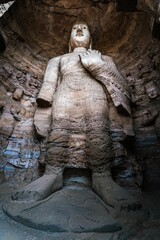 Fototapeta na wymiar Buddhist Caves and Sculptures in Yungang Grottoes, Shanxi, China