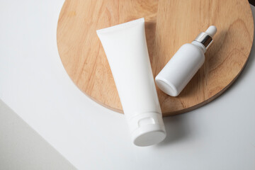 mockup of beauty fashion cosmetic makeup bottle lotion  serum product with skincare healthcare concept on background