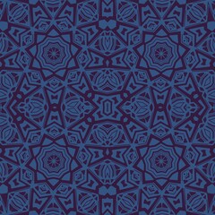 dark seamless pattern of blue flowers on a purple background