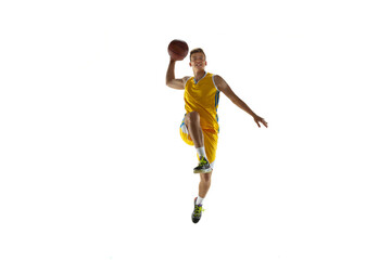 Fototapeta na wymiar One young man, basketball player with a ball training isolated on white studio background. Advertising concept. Fit Caucasian athlete jumping with ball.
