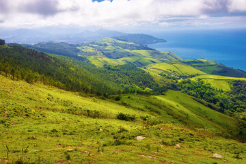 Panoramic view of the slope of the Jaizkibel mountain and the coast of the mouth of the Bidasoa river, Euskadi, Spain