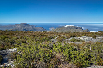 Panoramic view from top of Table Mountain to Hout Bay, Cape Town, South Africa.