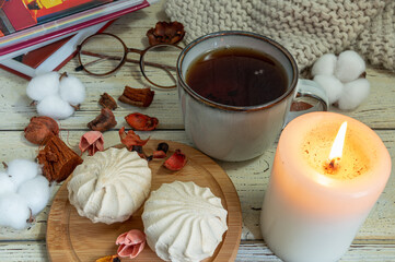 cozy autumn with a cup of tea and books